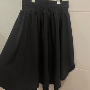 Lululemon athletica |Time to Flounce Black midi skirt | size 4